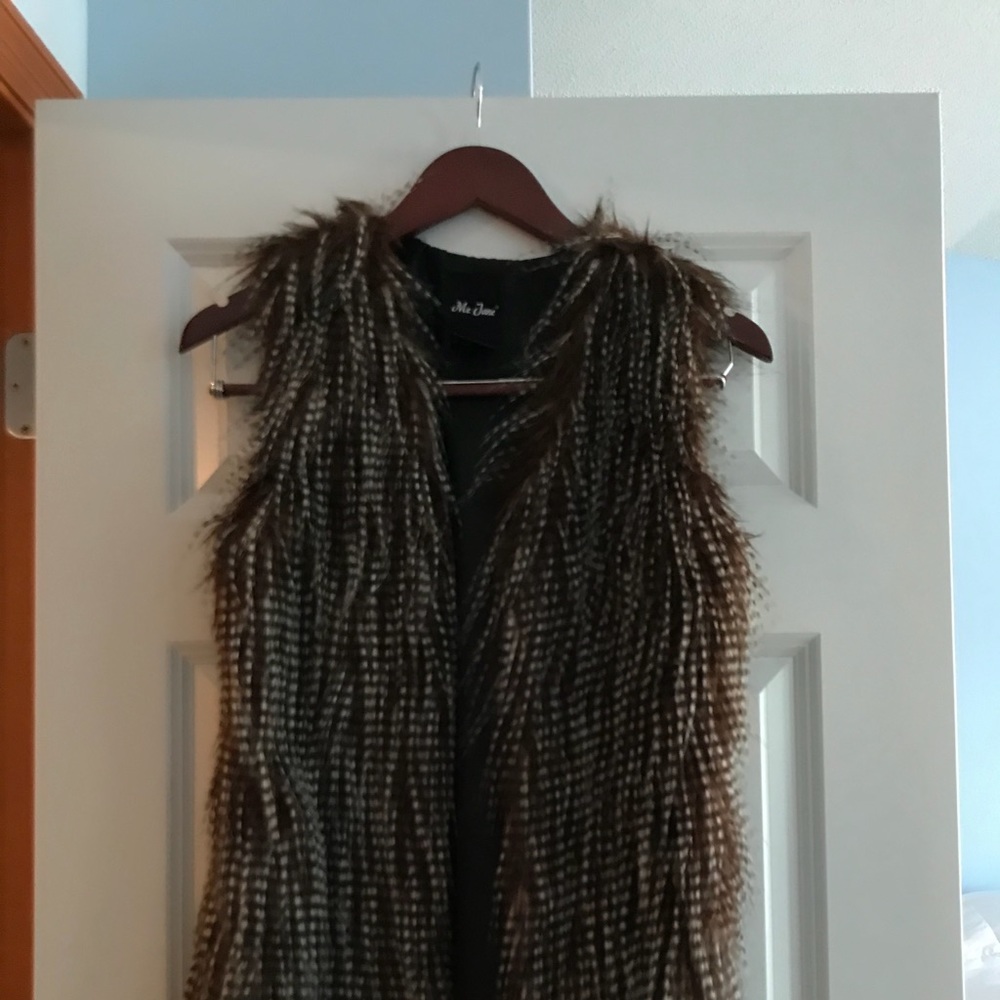 Feathered vest
